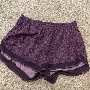 Athleta mesh racer running shorts with 4 in inseam. Purple color and size large